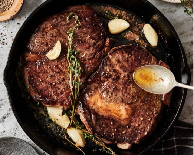 pan-seared steak with butter and garlic